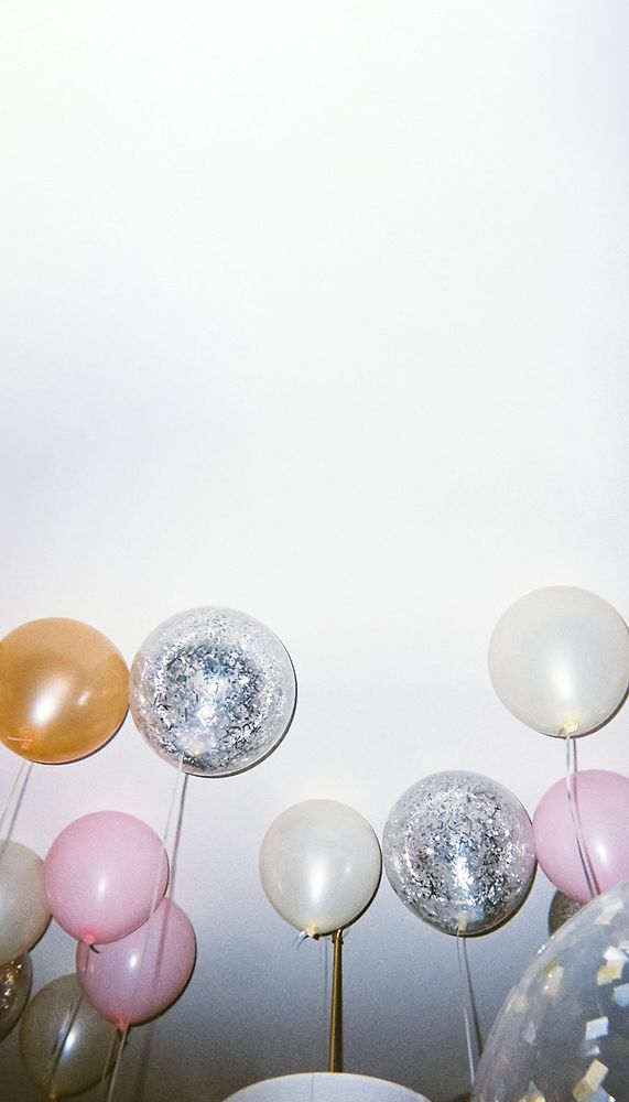 Floating balloons border iPhone wallpaper, party image