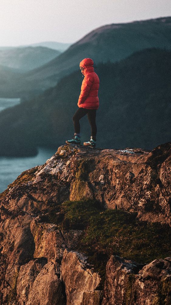 Man standing cliff iPhone wallpaper, nature travel image