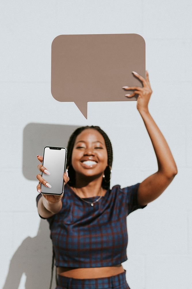 Black woman holding blank speech bubble sign