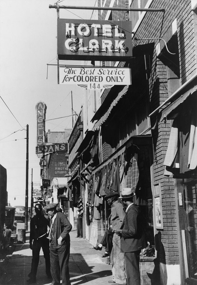 Secondhand clothing stores and pawn shops on Beale Street, Memphis, Tennessee. Sourced from the Library of Congress.