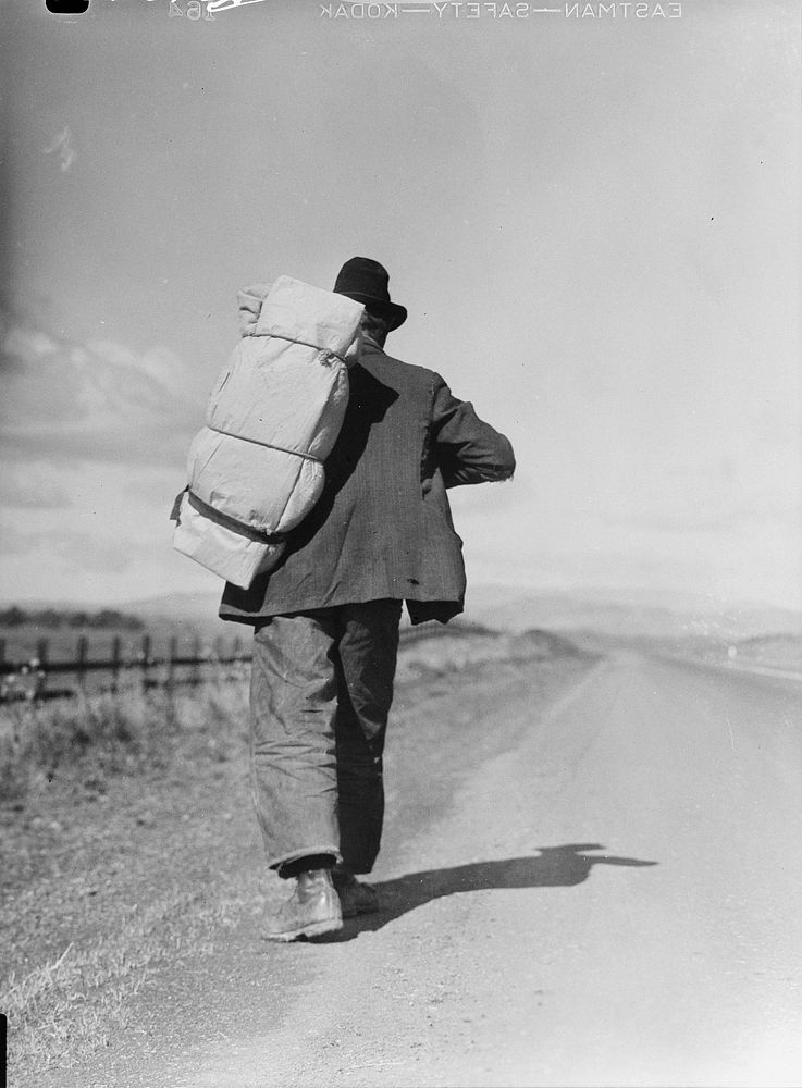 Migrant worker on California highway by Dorothea Lange