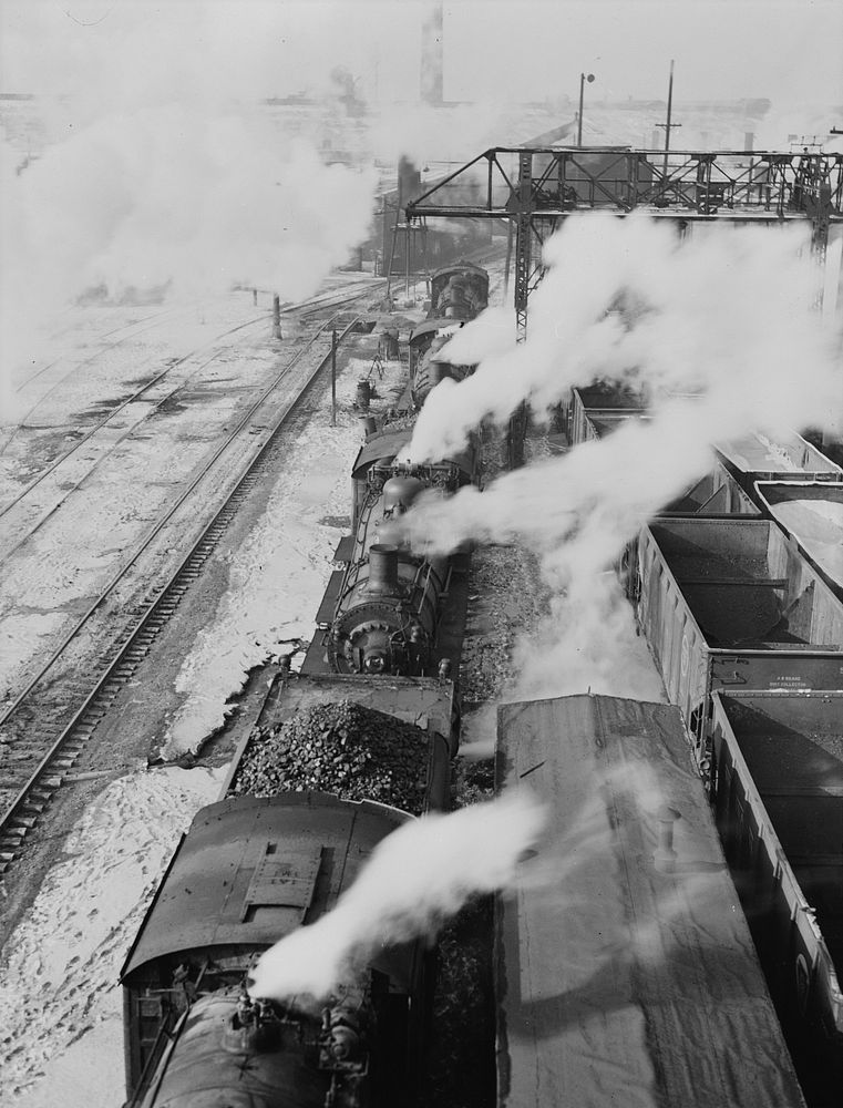 Chicago, Illinois. Locomotives lined up for coal, sand and water at the coaling station in the yard of the Chicago and…