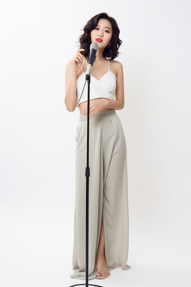 Microphone holding fashion singer. AI generated Image by rawpixel.
