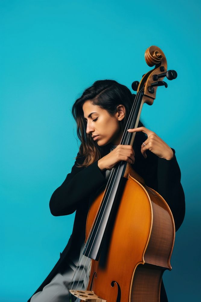 Musician portrait cello concentration. AI generated Image by rawpixel.