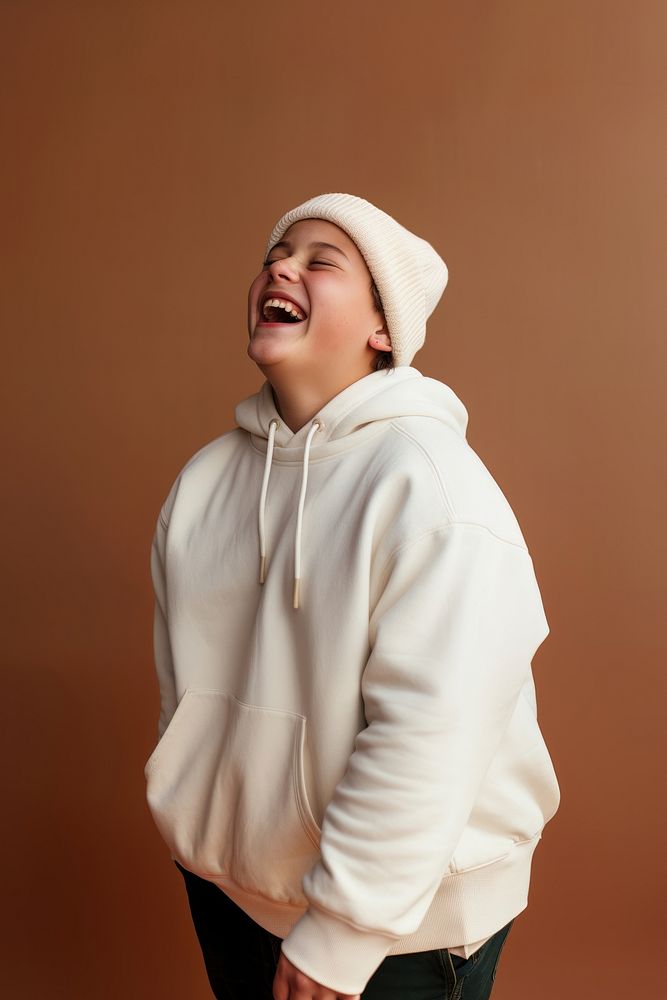 Laughing sweatshirt white studio shot. 