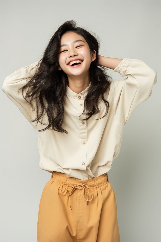 Laughing cheerful fashion blouse. 