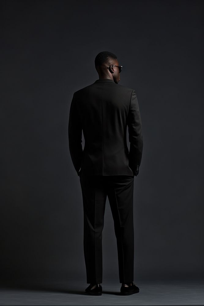 Standing black adult men. 