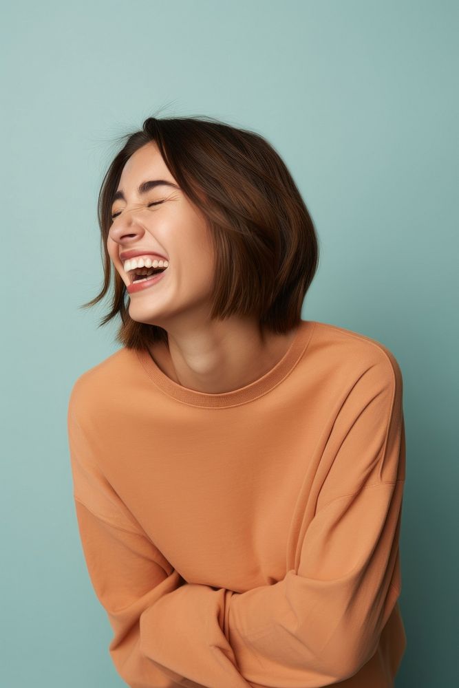 Laughing sweater smile adult. AI generated Image by rawpixel.
