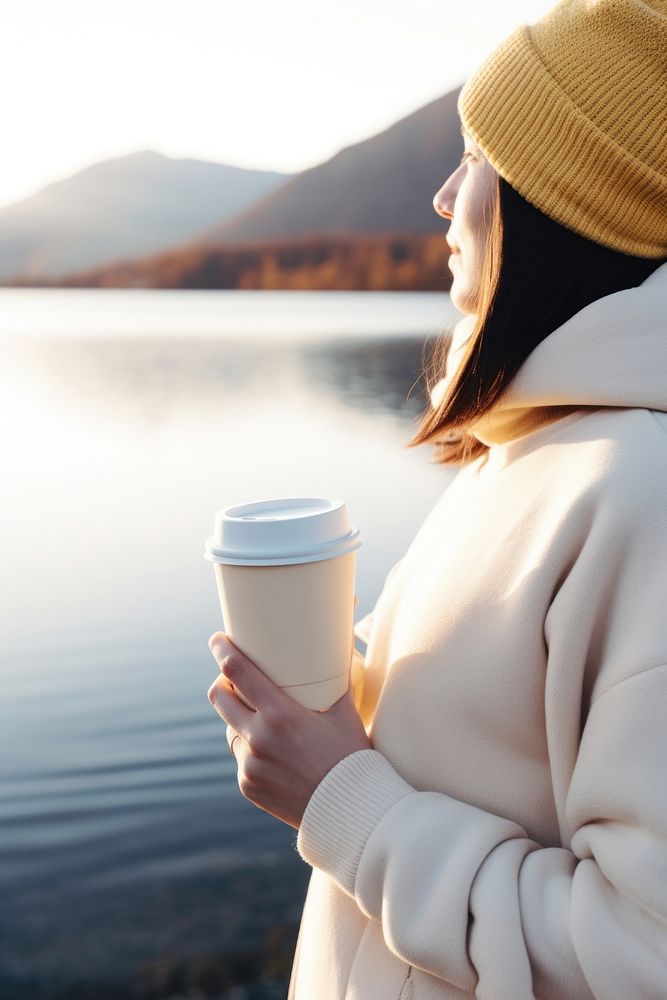 Coffee cup portrait outdoors. 