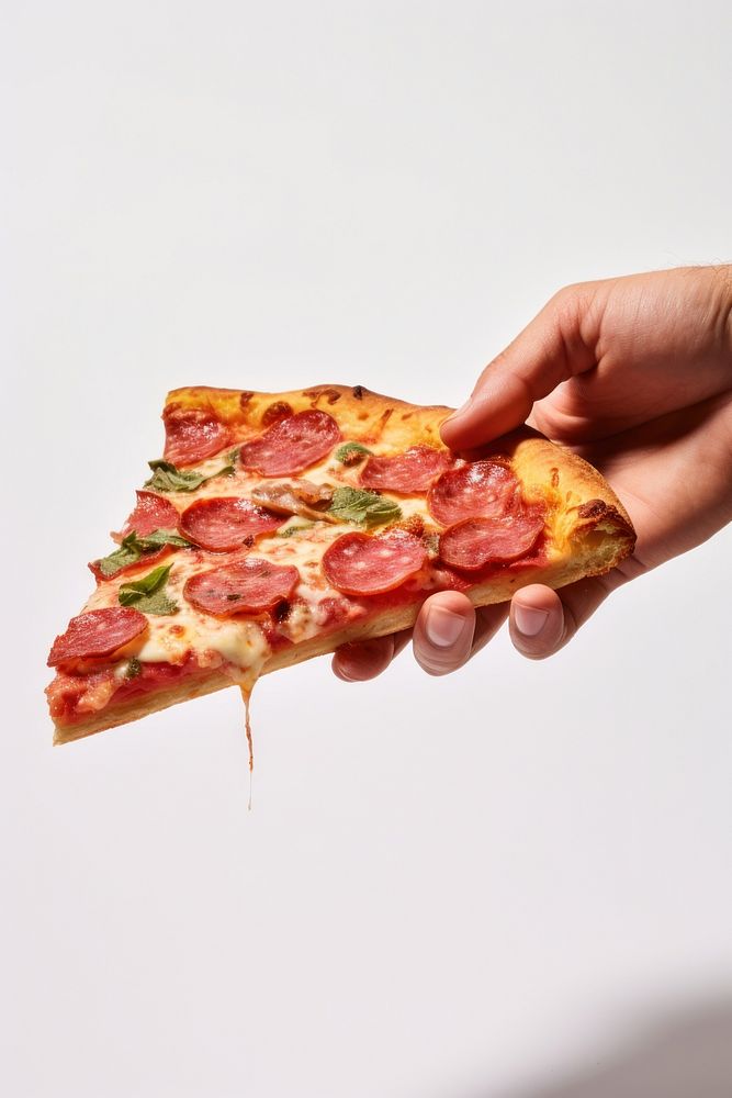Pizza food hand studio shot. AI generated Image by rawpixel.