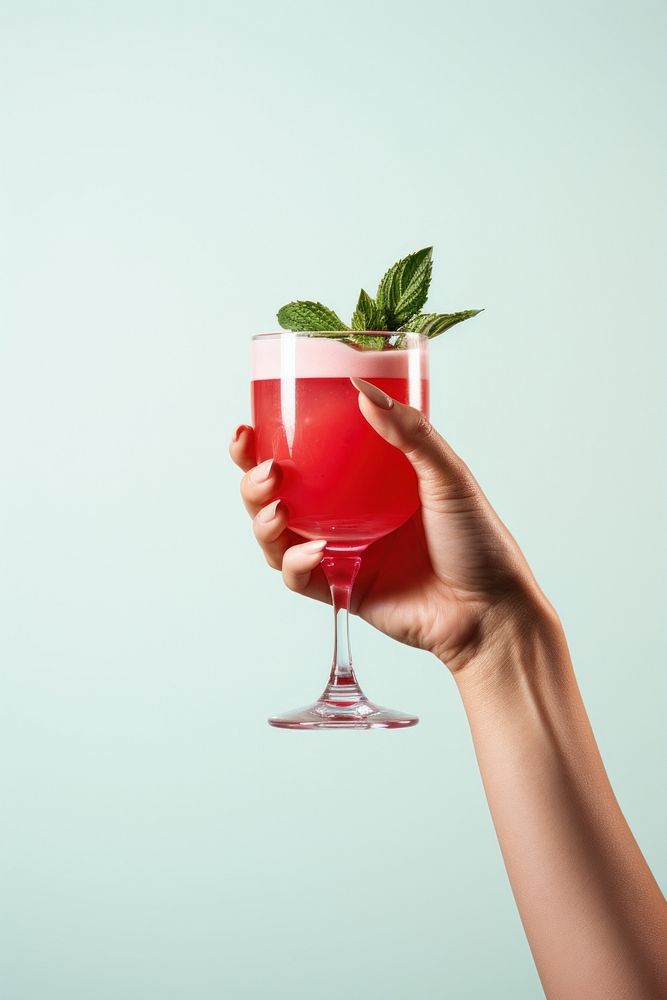 Cocktail holding drink glass. AI generated Image by rawpixel.