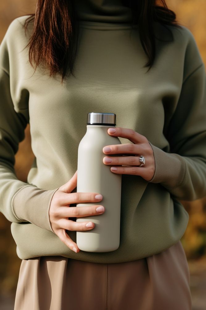 Bottle holding adult woman. AI generated Image by rawpixel.