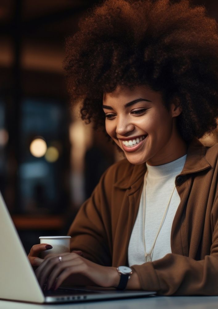 Woman using a laptop computer adult portability. AI generated Image by rawpixel.