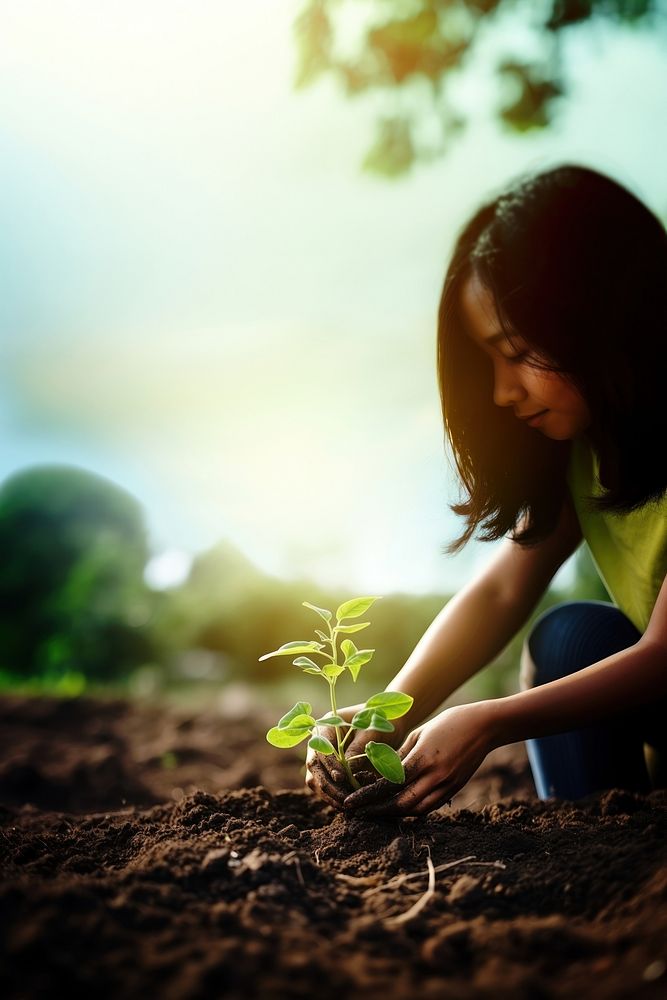 Photorealistic of diverse teenager planting a garden. AI generated Image by rawpixel. 