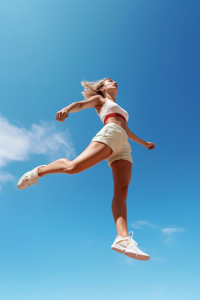 Female jumping sports blue. AI generated Image by rawpixel.