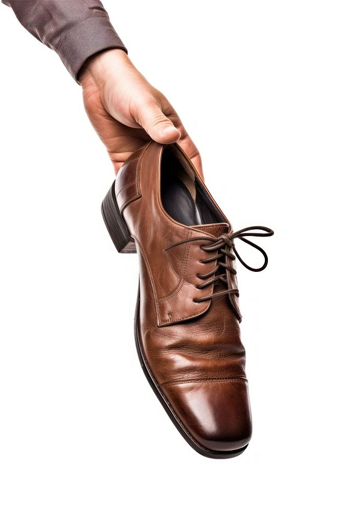 Leather shoes footwear hand white background. AI generated Image by rawpixel.