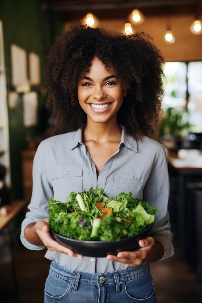 Black woman portrait smiling holding. 