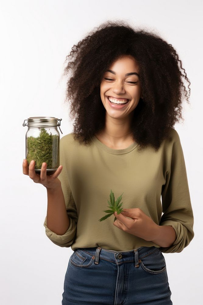 Female holding marijuana jar adult happy. AI generated Image by rawpixel.