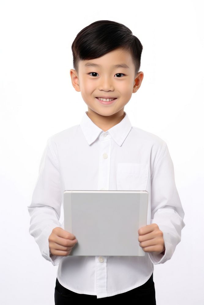 Asian kid boy portrait computer holding. AI generated Image by rawpixel.