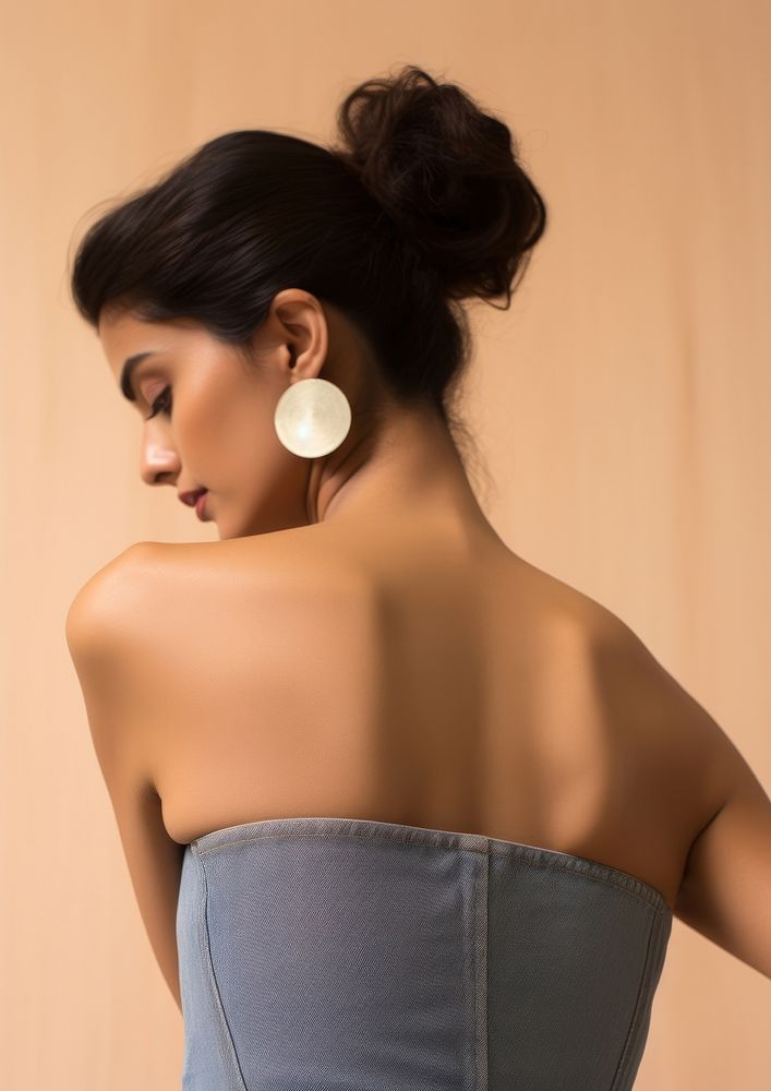 Woman wearing a Strapless back strapless earring. AI generated Image by rawpixel.