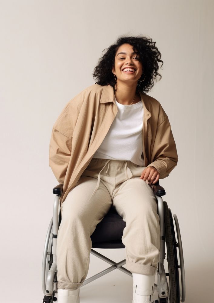 A disabled woman wheelchair smiling sitting. AI generated Image by rawpixel.