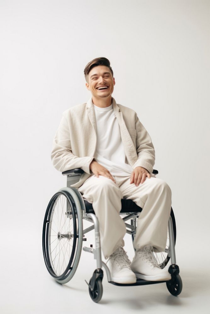 A disabled man wheelchair smiling sitting. AI generated Image by rawpixel.