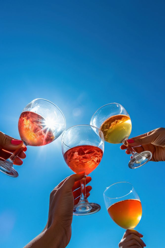 Cocktail glass outdoors drink. AI generated Image by rawpixel.