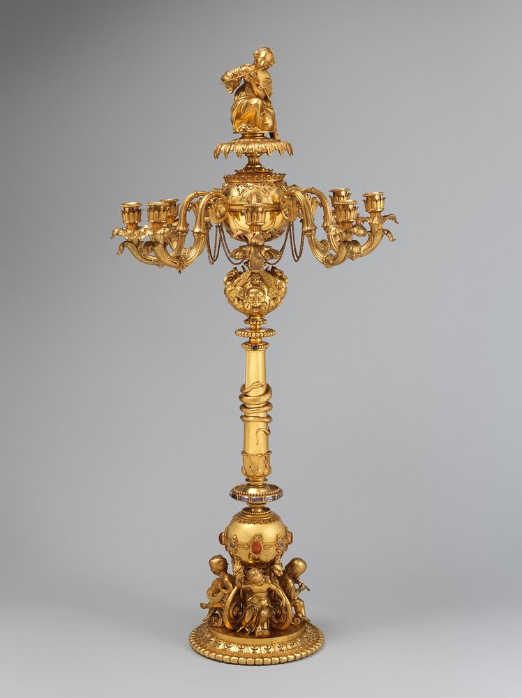 Candelabrum with woman playing flute (one of a pair)