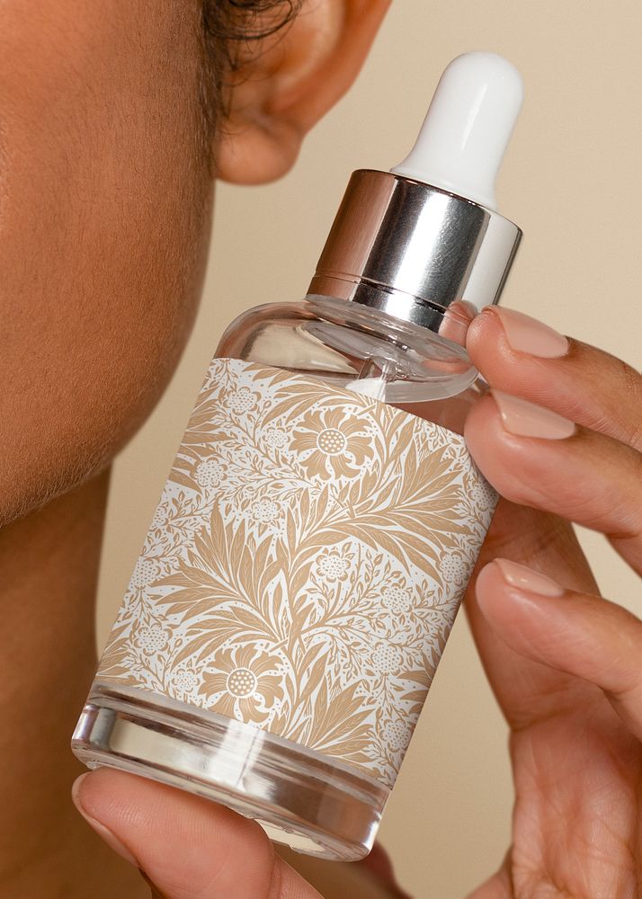 Serum dropper bottle, skincare product packaging inspired by William Morris pattern, remixed by rawpixel