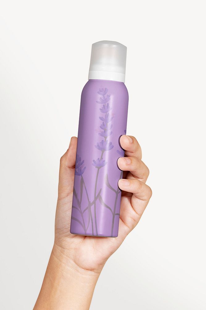 Woman holding a purple floral spray bottle