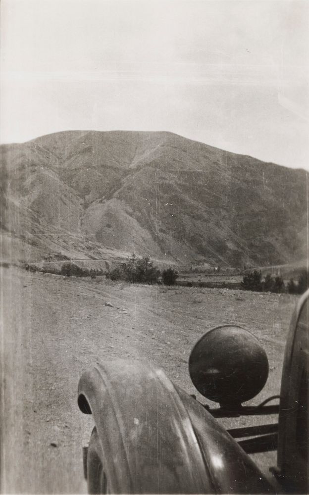  View of Mountain with Automobile Fender in Foreground