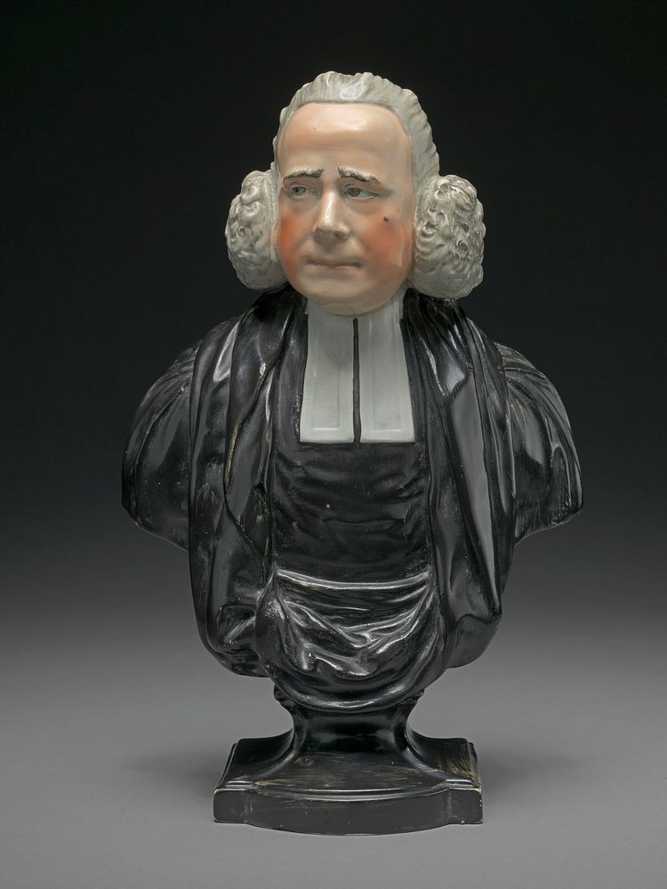 Bust of the Reverend George Whitfield: with ruddy cheeks, prominent mole, black robes and clerical collar