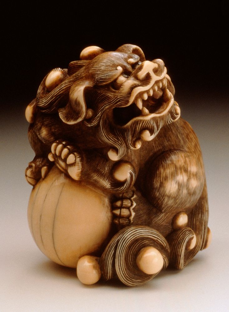 Chinese Lion Guarding the Jewel of the Buddha