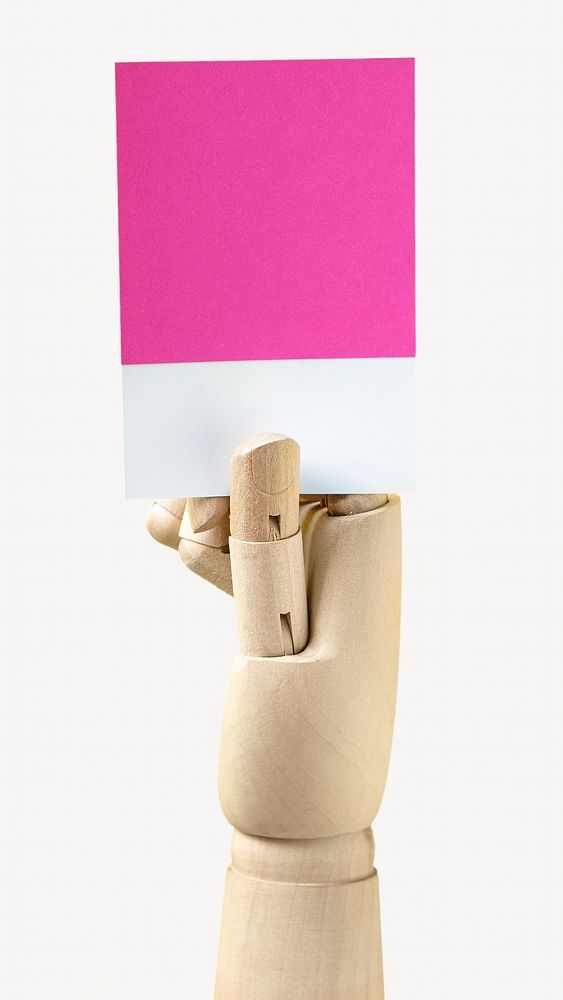Wooden hand holding a blank paper isolated image