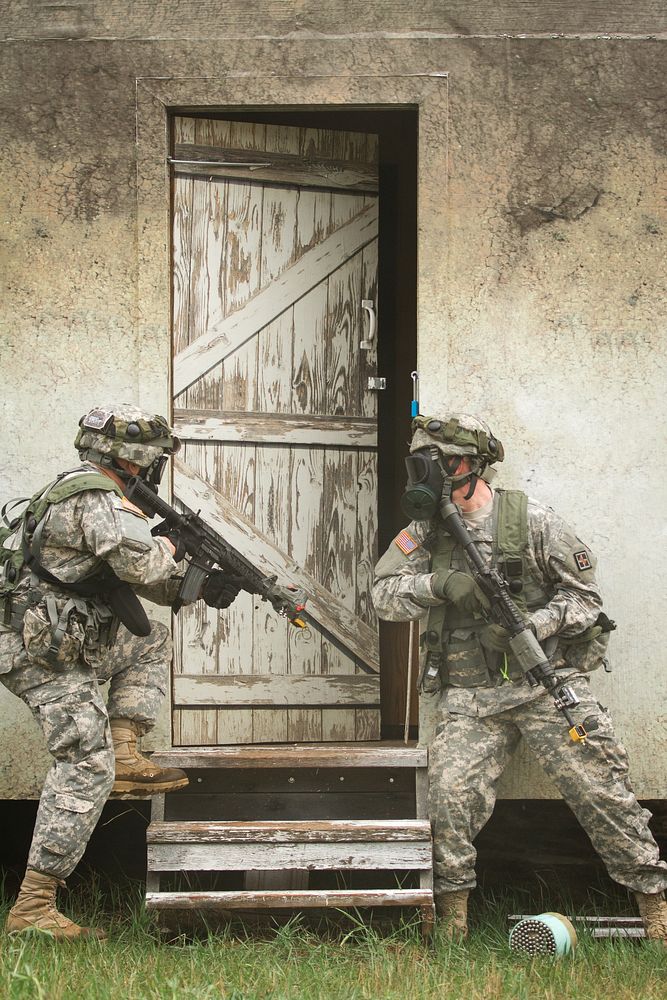 U.S. Soldiers with the 44th Chemical Company, 2nd Chemical Battalion, 48th Chemical Brigade enter and clear a building of…