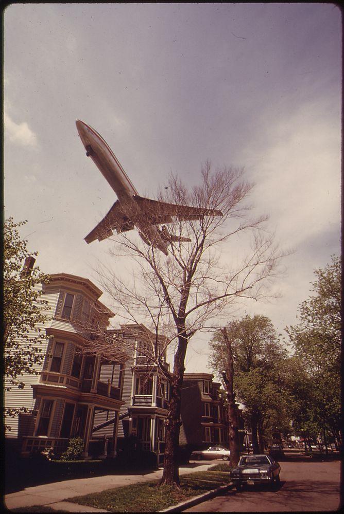 Jet Zooms Over Southwestern Side of Neptune Road. Original public domain image from Flickr