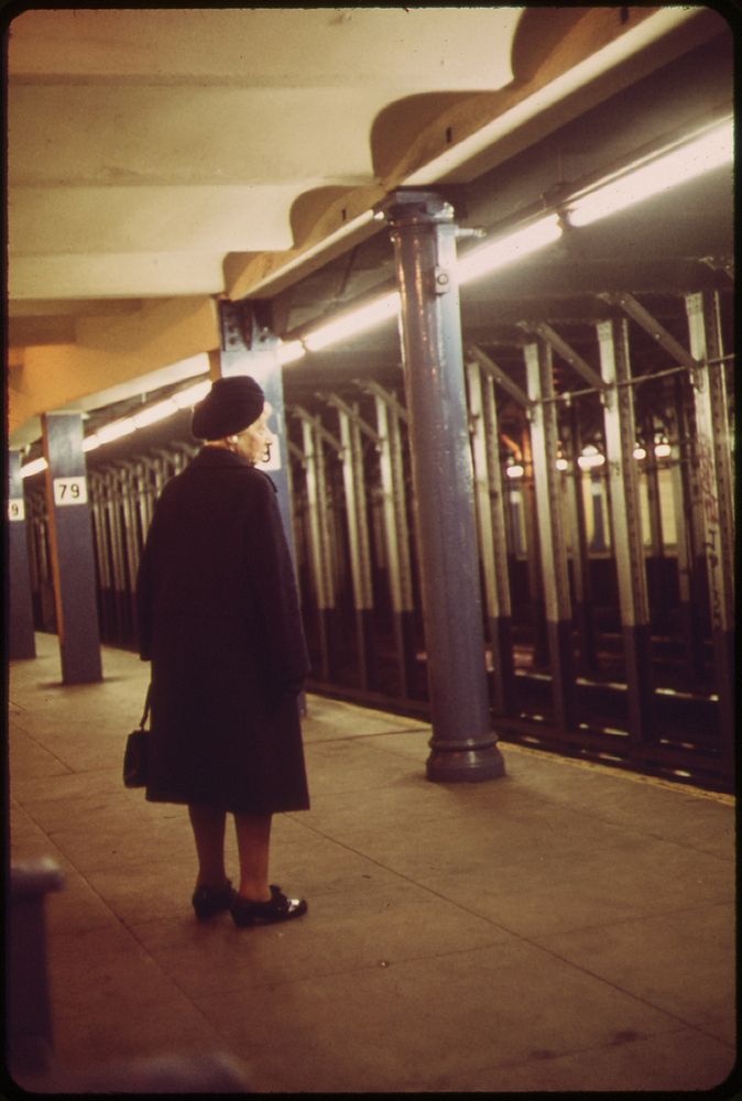 A Woman Waits for A Train at the 79th Street Station, 05/1973. Original public domain image from Flickr