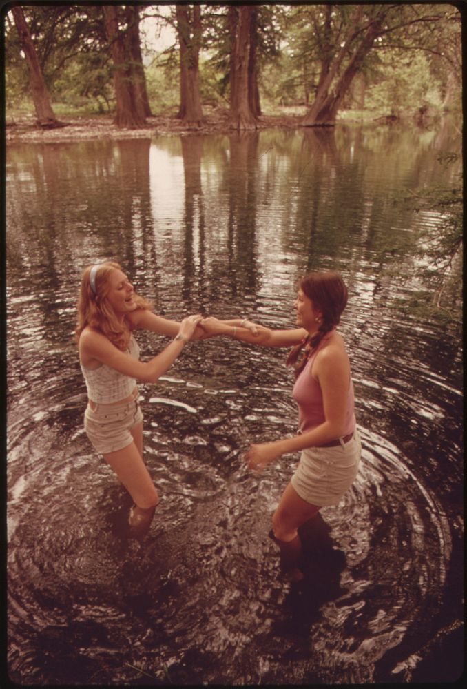 Teenage Girls Wading the Frio Canyon River near Leakey Texas, While on an Outing with Friends near San Antonio 05/1973.…