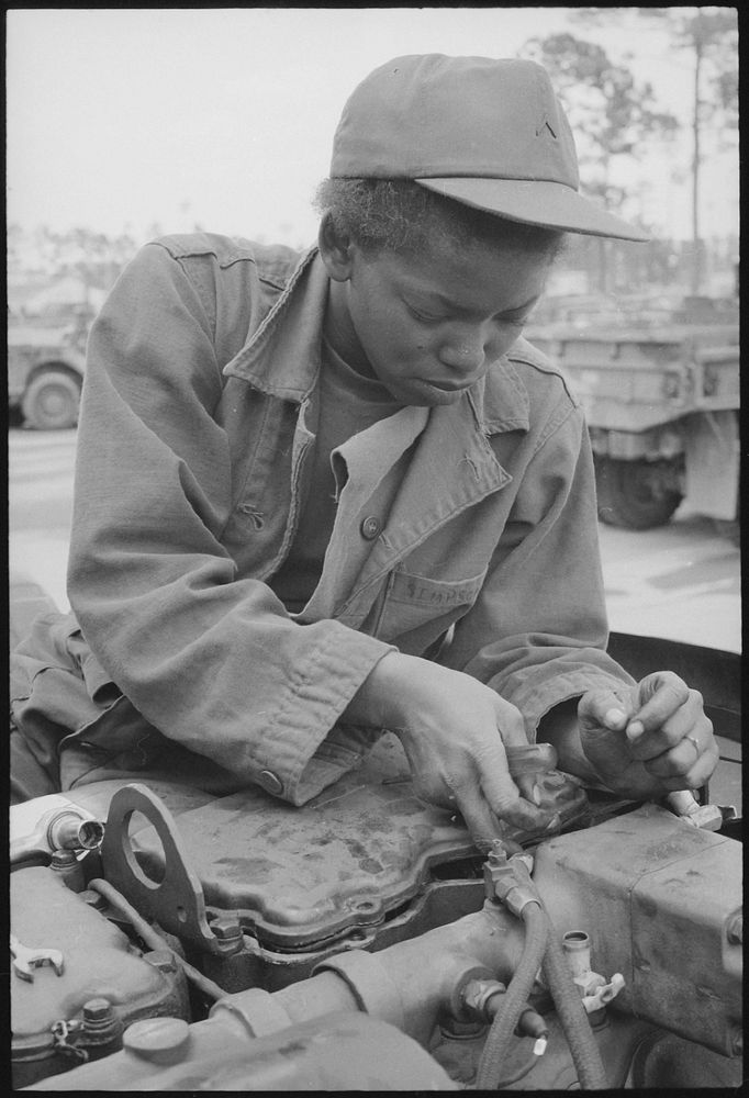 "Fort Stewart, Georgia. Female Auto Mechanic. Private Lawanna Simpson, an Auto Mechanic, 724th Maintenance Batallion, Works…