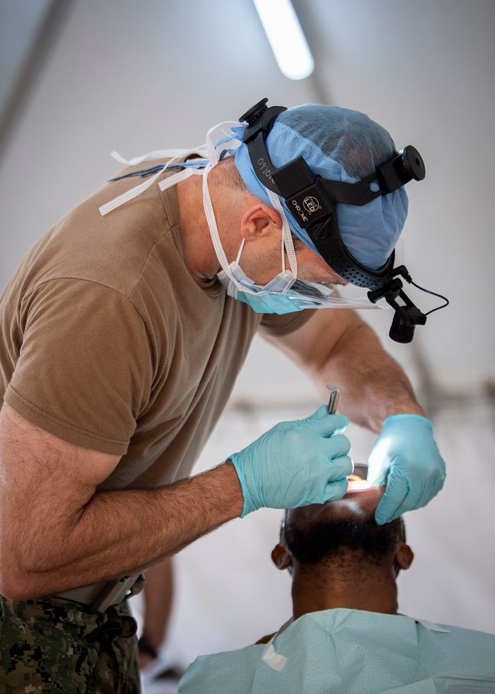 Cmdr. Peter Cervenka, an oral and maxillofacial surgeon from Concord, California, assigned to the hospital ship USNS Comfort…