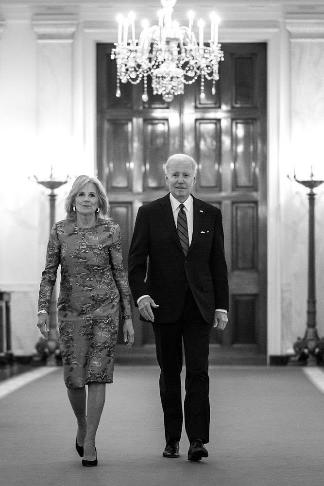 President Joe Biden and First Lady Jill Biden walk down the Cross Hall to attend a Lunar New Year Celebration in the East…