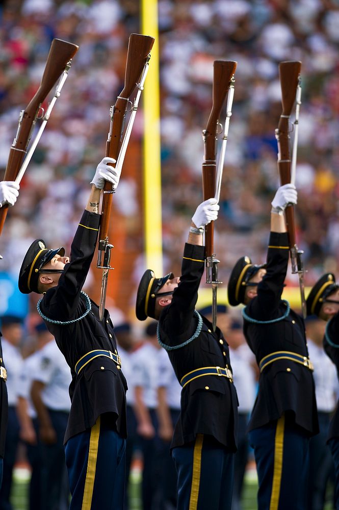 U.S. Soldiers assigned to the 3rd U.S. Infantry Silent Drill Team perform during the 2012 National Football League Pro Bowl…