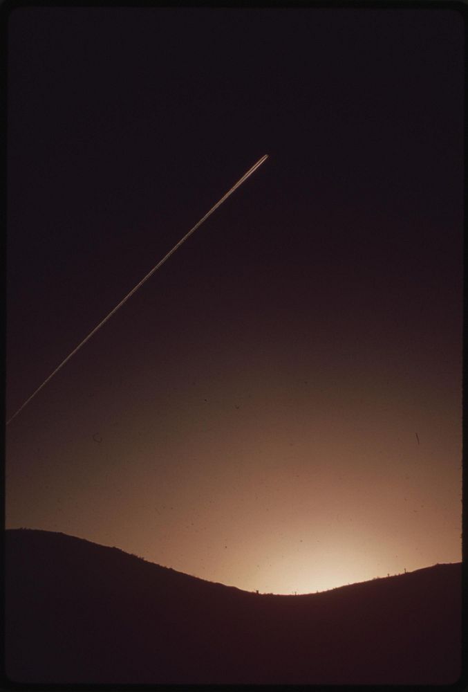Contrail at dusk. Searchlight, Nevada. (from the documerica-1 exhibition. For other images in this assignment, see fiche…