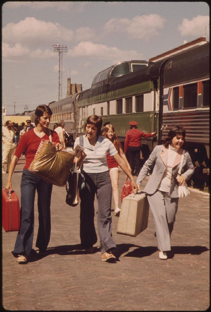 Passengers at trackside at the Fargo, North Dakota, station Amtrak's Empire Builder, enroute from Chicago to East Glacier…