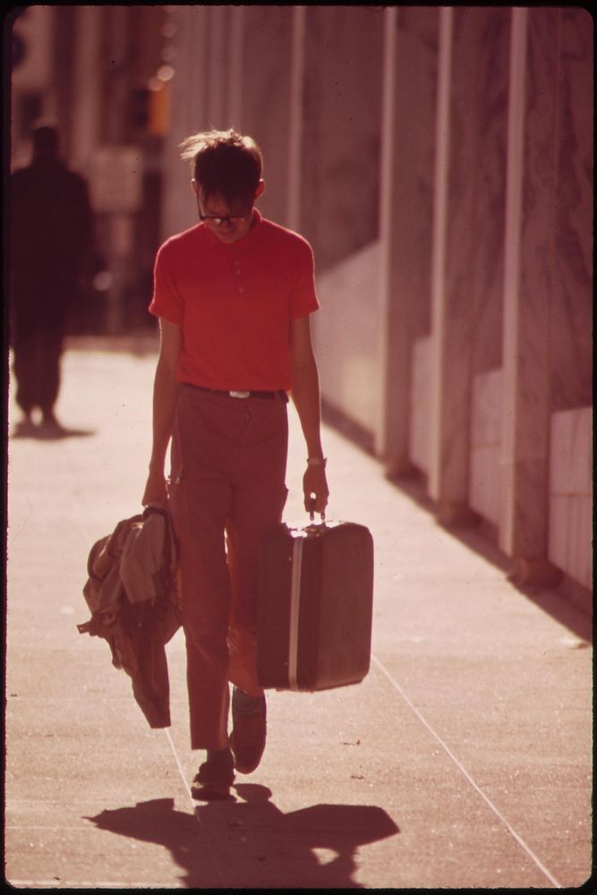 On a street in downtown Omaha, May 1973. Photographer: O'Rear, Charles. Original public domain image from Flickr