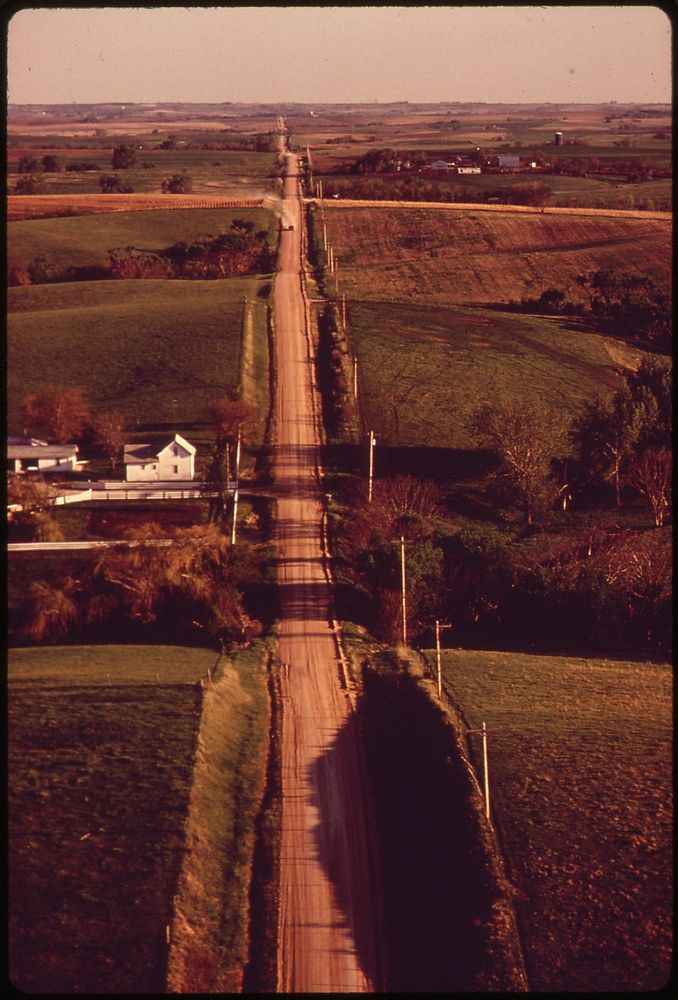 Looking south along county road in farmlands of Seward County, May 1973. Photographer: O'Rear, Charles. Original public…