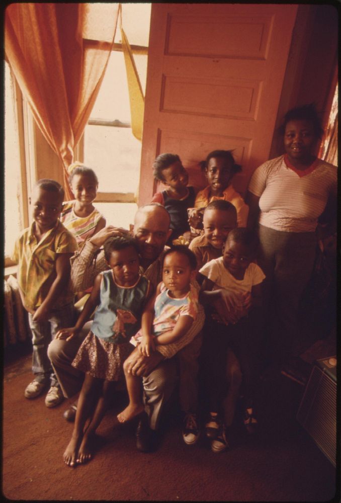 Black Mother And Father With Their Eight Children In Chicago's South Side Ghetto, 07/1973. Photographer: White, John H.…
