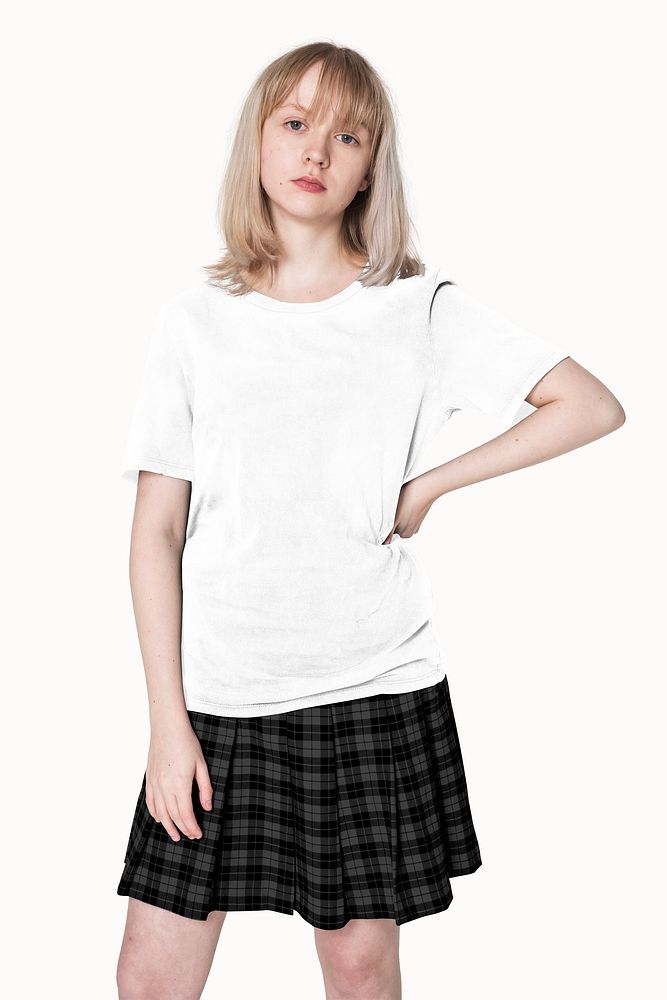 Young woman in white tee & pleated skirt