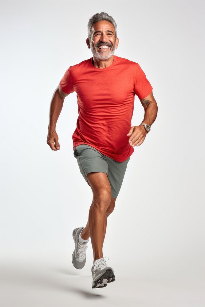 60 years old hispanic Senior man running footwear smiling jogging. AI generated Image by rawpixel.