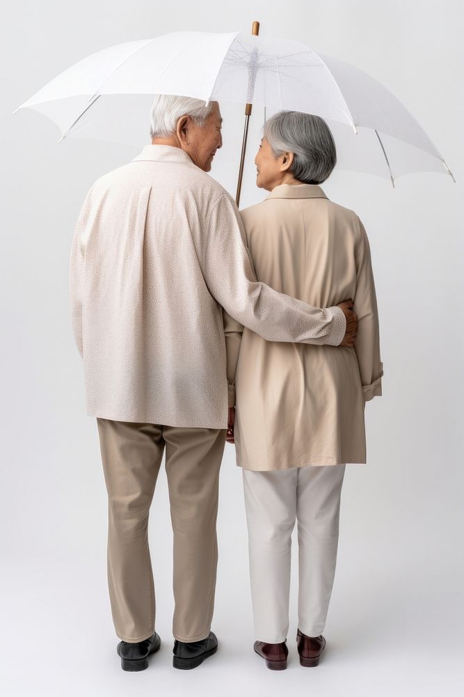 Umbrella adult white background togetherness. AI generated Image by rawpixel.